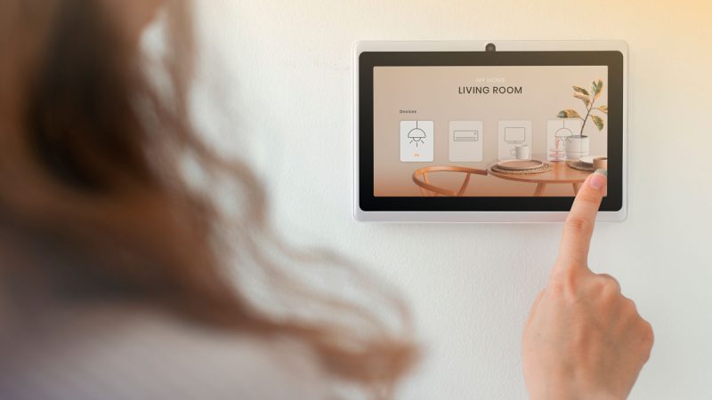 smart-home-innovation-technology-with-woman-using-control-panel