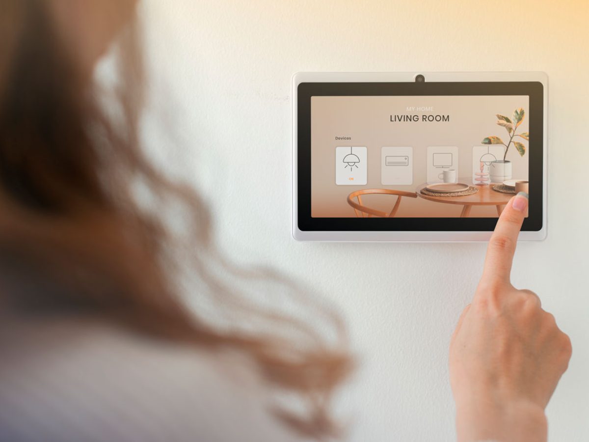 smart-home-innovation-technology-with-woman-using-control-panel